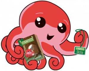 Octo holding a programme booklet and convention badge